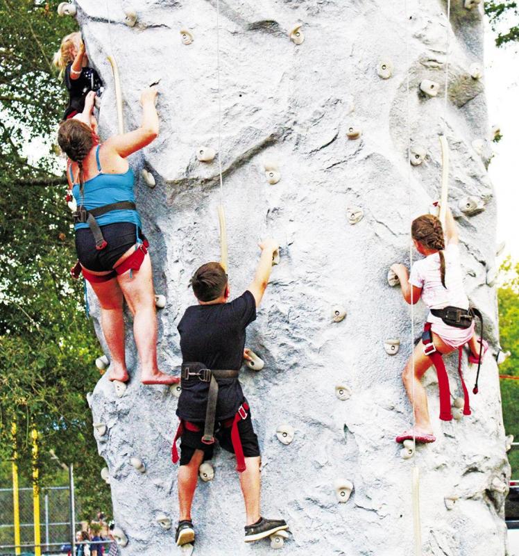 The new attraction at Groesbeck National Night Out ‘23 was a 26’ rock climbing wall. Many climbers took turns trying to reach the top Tuesday, August 1, NNO is an event hosted by Groesbeck PD and local organizations/businesses. Jennifer Paul photo/Gro Night Out in Groesbeck