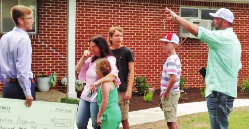 As a result of community effort and the assistance of the non-profit Kailee Mills Foundation, the Ferguson family was reunited on Thurs., May 21, and given keys to a fully-furnished three-bedroom, two-bath brick home in Groesbeck. Contributed photo. Reunited and it feels so good
