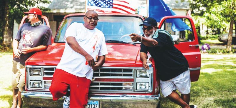 Gabby Masters (pictured mid) drove a red 86’ Chevy during the ride, he was accompanied by Ernest Tatum (pictured right). Danny Fulmer looks on (pictured left). Red, White, and VroomRed, White, and Vroom