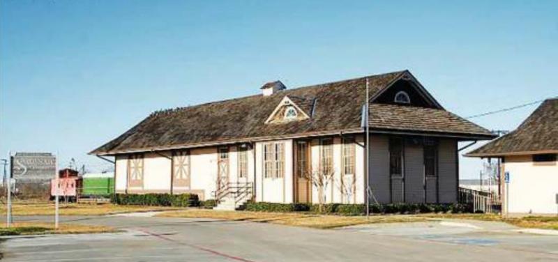 Saginaw Chamber of Commerce which used to be the Kosse depot building includes a watermark of the artist Whispers of Kosse’s Past