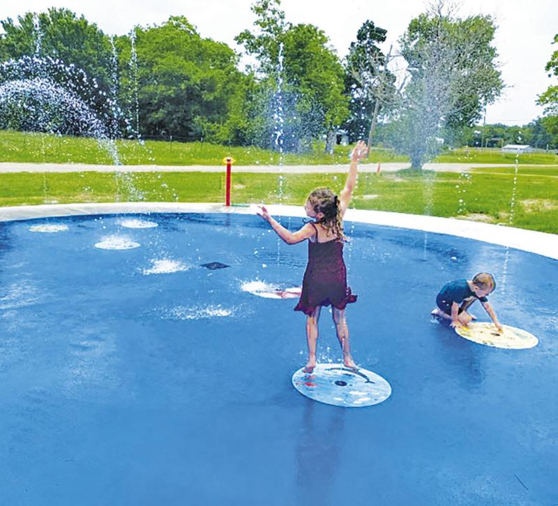 The Splash Pad at Kosse City Park is officially up and running, providing plenty of free, splashing fun for kids of all ages! Pictured are Paisley and Parker Brouillette, enjoying the spray of cool water as the Texas summer heat sets in. Alexandra Cannon photo/Groesbeck Journal The Splash Pad at Kosse City Park is officially up and running, providing plenty of free, splashing fun for kids of all ages! Pictured are Paisley and Parker Brouillette, enjoying the spray of cool water as the Texas summer heat sets in. Alexandra Cannon photo/Groesbeck Journal