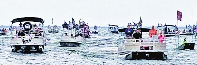 The boats on Lake Limestone are bunched up near Robertson Dam, waiting for the Trump Parade to begin Saturday, Sept. 5. Once it started, the boats kept a greater distance from each other. Contributed photo by Phil Miller Trump support boat parade attracts 100-200 boats to Lake Limestone