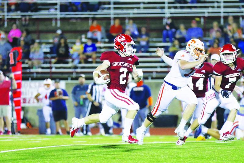 Groesbeck linebacker Coker Holloway (2) returns an interception against Teague on Wednesday night. The Goats defeated Teague 51-41 to clinch a playoff spot. Photo by Angela Crane/For the Groesbeck Journal Article Image Alt Text
