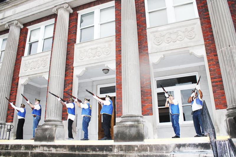 American Legion Post 288 members perform a 21-gun salute in honor of fallen soldiers at the Memorial Day observance ceremony on Monday, May 26.