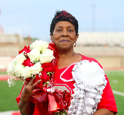 Mrs. Earlene Asberry Moore was surprised at the pregame ceremony as the chosen Groesbeck Ex-Students Queen. Earlene is a 1972 graduate of the Groesbeck.