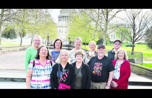 Standing in front of the U.S. Capitol are: (Back l-r) Donna Gipson, Cindy Hillis, deLou Corbitt, Sheree Wood, Ray Jones; (front l-r) Masami Lemaster, Hanida Oliver, Sharon Wilson, Don Corbitt, Connie Jones