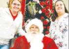 Farmers State Bank hosted pictures with Santa to reign in the holiday