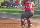 BELOW: Catcher Janae Trojacek checks the runner at third base after a hit by Fairfield. Lady Goats fall to Fairfield