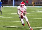 Trent Platt hits the corner on a rushing attempt during the Groesbeck football team’s road matchup against Crockett. Platt started in place of injured quarterback Anthony Lewis. Platt finished with 200 yards passing and three touchdowns through the air. Goats bitten by Bulldogs, 39-34
