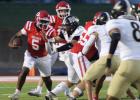 Running back Ja’marya (Jay) Hall (No. 5) bulls his way through the McGregor defense on this play, as the Groesbeck Goats crushed the Bulldogs at home, 45-27. Hall led the Goat offense with 24 carries for 150 yards and two touchdowns in the win. Photo by