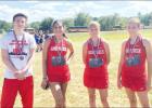 BELOW: Groesbeck runners who earned medals at the Elkhart meet Saturday were (from left) Kevin Cates, 13th in the varsity boys’ race; Alidah Figard, fifth in the varsity girls’ race; Katlyn Carder, 13th in the junior varsity girls’ race; and Ella Su Goat runners compete at Elkhart