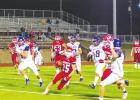 Goat sophomore Chris Cox eludes defenders in Groesbeck 43-20 win. Article Image Alt Text