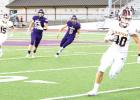 Fairfield’s Luke Latham picks up some yardage on a reception during the Eagles’ district victory. Photos by Thomas Leffler/Fairfield-Recorder Article Image Alt Text