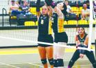 Coolidge Lady Yellowjacket defenders get the block during their match with Mt. Calm last Tuesday. The Lady Jackets got the district win over the Lady Panthers. Courtesy of Coolidge ISD Facebook page Coolidge Lady Yellowjacket defenders get the block during their match with Mt. Calm last Tuesday. The Lady Jackets got the district win over the Lady Panthers. Courtesy of Coolidge ISD Facebook page