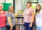 The Jonathan Hardin Chapter of the National Society Daughters of the American Revolution donate a copy of Texas Before the Lone Star State to Gibbs Memorial Library in Mexia. Pictured are: Patti Gauntt, Jonathan Hardin Chapter; Shien-Dee Pullman, Director