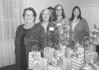 BELOW: Study Club hostesses for the evening pictured (l-r) Mary Belle Leach, Janice Levi, Melissa Jarvis, and Kerrie Cobb. Study Club hears program on wind turbines