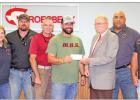 All five Groesbeck Police cars will be outfitted with bullet-resistant windshields thanks to a donation from the Mutual Assistance Group (MAG) in the amount of $17,500. Groesbeck Mayor Ray O’Docharty accepted the check on behalf of the city at the Counc Article Image Alt Text