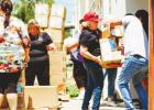 Local children blessed with school supplies before the start of school
