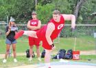 Kallen Rogers eyes his shot put throw at the area track meet in Rockdale on April 21. Rogers finished in first place and advances to the regional competition in Waco. Rogers’ winning throw was 45 feet 2 ¼ inches. Groesbeck’s Rogers, Corn advance to regionals in shot put