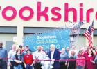 Members of the Groesbeck Chamber of Commerce, City of Groesbeck, Groesbeck EDC and Brookshire’s managers and employee partners participate in the store’s re-grand opening ribbon cutting on Thurs., July 14. Edgar Estrada photo/Groesbeck Journal Super Market Sweep-ing Changes