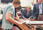 Commissioners approve sale of surplus county vehicles, end sand bid business and keep burn ban on for now