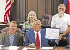 ssion was presented the Distinguished Service Award for 2021 at the Commissioners Court meeting on Tuesday, Aug. 9. Pictured, from left, are CHC members Linda Ferris and Bubba McDonald, along with Commissioners Bobby Forrest, Stephen Friday, Judge Richard Commissioners reconsider sand bid; Talk tax rate, appraisals, and more