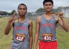 Groesbeck’s Floyd King (left) and Nicholas Ramos (right) display their medals for finishing in the top-10 at the Fairfield Golden Eagle Run on Saturday. Contributed photos Article Image Alt Text