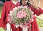 Aniyah Henderson and Avrian Ray pose for a photo together after graduation. Photo Submitted by Neshia Wiley Aniyah Henderson and Avrian Ray pose for a photo together after graduation. Photo Submitted by Neshia Wiley