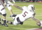 TOP: Mexia running back Jarrell Wiley stretches the ball across the goal line for one of his three rushing touchdowns against Fairfield on Friday night. The Blackcats rolled to a 37-10 win to remain unbeaten in district play. Fairfield dropped to 2-1 in d ’Cats take advantage of Eagle miscues for win