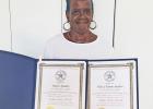 Debbie Wilson McCall shows the certificates she received in recognition of her great grandparents, Horace Sanders and Eliza J. Cotton Sanders, for being one of the First Families of Limestone County. Photo by Jennifer Bynum/The Mexia News