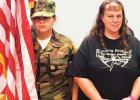 Mary and Michelle Mullinix. Mary (in uniform) presented the colors to recite the Pledge of Allegiance and Michelle, her mother, told about the Young Marines which Mary is a member. They now have a chapter in Limestone County. County Judge visits with Study Club