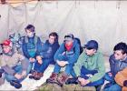 Scouts sit around a campfire inside a tee pee, listening to Mexia Scoutmaster Clint Flatt (not shown) tell how native Americans built and lived inside the animal-hide structures. The activity was part of Saturday’s Annual Indian Nations District Freez-o Scouts sit around a campfire inside a tee pee, listening to Mexia Scoutmaster Clint Flatt (not shown) tell how native Americans built and lived inside the animal-hide structures. The activity was part of Saturday’s Annual Indian Nations District Freez-o