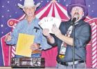Photos by Roxanne Thompson/The Groesbeck Journal Magician Jeffrey Jester, of Austin, performs a card trick with auctioneer H.G. Wilson, of Groesbeck, at the annual gala fundraiser hosted by the Mexia State Supported Living Center Volunteer Council. The ev Article Image Alt Text