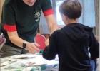 Returning park volunteer Frances Turner assists at the craft table during Fort Parker State Park’s Lakeside Christmas event last year. Contributed photo