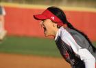 Groesbeck first baseman Hannah Galvan shouts encouragement to her teammates during a game against Crockett last week. The Lady Goats ripped Crockett, 20-1. Slugging Lady Goats pound out two wins in district play