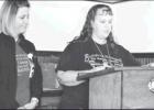 Two LMC employees speak to Groesbeck Lions Club last week