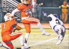 Teague’s Roberto Escobedo avoids a Whitney player as he attempts to block a point-after kick. Escobedo was perfect on his four PAT tries in a 61-28 loss to Whitney on Friday night. Photos by Risken J photography Whitney stays unbeaten in district with win over Teague