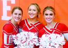 Chloe Crane, Ava Sadler, and Gracie DeCordova cheer on the Goats in Teague on Tuesday night. Photo by Mitchell Pate/Groesbeck Journal