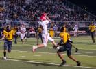 Malakoff holds off stubborn Goats in district battle for first place