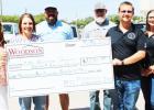 The Limestone Medical Center (LMC) is working to reinstate the Sexual Assault Forensics Examination (SAFE) Program so that victims can be treated locally instead of sent to another hospital, and Woodson Lumber donated $1230 toward their efforts at their c Woodson Lumber celebrates 30 years