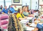 Commissioners approve sale of surplus county vehicles, end sand bid business and keep burn ban on for now