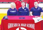 Groesbeck High School senior Zach Wilson (seated, center) signed a letter of intent Wednesday, Feb. 3, to play football at University of Mary Hardin-Baylor. Seated with Wilson are his mom, Brandye Wilson (left) and his dad, Scott Wilson (right). Standing Article Image Alt Text