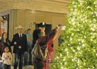 Loretta Dupree, escorted by Sergeant Josh Bell of Groesbeck Police Department, placed an ornament on the Tree of Angels for herself, as a survivor of violent crime on more than one occasion. Alexandra Cannon photo/Groesbeck Journal Crime victims honored at Tree of Angels