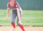 Senior Presley Stanfield watches the pitch from second base.