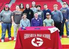 Groesbeck’s Zach Wilson (seated, center) takes a photo with some of his football teammates after signing a letter of intent to play football at University of Mary Hardin-Baylor. Contributed photo. Article Image Alt Text