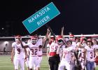 The Groesbeck Goats reigned in the win at the renewal of Battle of the River with a 37-36 victory over Mexia at Blackcat Stadium on Friday night. The score set off a wild celebration on the Groesbeck side of the stadium since this was the first time in 36 years that the Goats took home the rivalry win from the Mexia home turf. The Goats raced across the field to a far corner of the end zone where the Navasota River sign was standing and triumphantly brought it back to their sideline, to bring back to Groesbeck once again. Angela Crane photo/For the Groesbeck Journal The Groesbeck Goats reigned in the win at the renewal of Battle of the River with a 37-36 victory over Mexia at Blackcat Stadium on Friday night. The score set off a wild celebration on the Groesbeck side of the stadium since this was the first time in 36 years that the Goats took home the rivalry win from the Mexia home turf. The Goats raced across the field to a far corner of the end zone where the Navasota River sign was standing and triumphantly brought it back to their sideline, to bring back to Groes