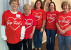 (l to r) Hostesses Sammye Wheat, Peggy Beck, Amanda Shugart, Sarah Bush, and Carol Sue Jenkins created a "Healthy Heart" theme for the evening, complete with festive decorations and a heart-conscious menu. Article Image Alt Text