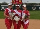Senior softballers Ali Platt, Sa’Riyah Smith, and Janae Trojacek pose for a picture at softball senior night on Wednesday, March 20. Contributed phots/Groesbeck Journal Article Image Alt Text