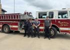 Captain Kody Daniel, Firefighter Roxanne Morris, Lieutenant Justin Hart and a member of the Robinson Fire Department head out to the flood zone in a RFD truck to assist with the massive search, rescue, and recovery effort. Courtesy Photo Article Image Alt Text