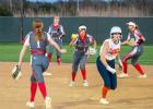 Jailyn Aparicio accends on a run down tag at the home softball game again Teague Lady Lions on Tuesday, Mar. 11. Article Image Alt Text